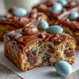 1. Soft peanut butter Easter egg cookie bars with colorful candies, perfect for festive spring celebrations and easy dessert sharing.  