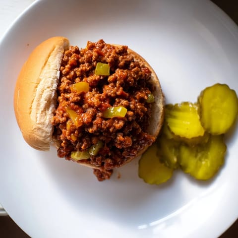 Golden toasted buns overflowing with saucy homemade Sloppy Joes, perfect for a classic family dinner.
