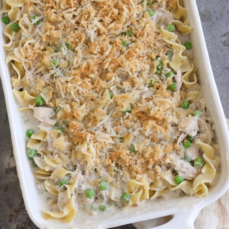 A family-style tuna casserole with crunchy Parmesan breadcrumbs pairs well with a crisp salad.