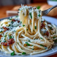Creamy lemon butter pasta with bright citrus flavor and silky sauce, garnished with fresh parsley and Parmesan.
